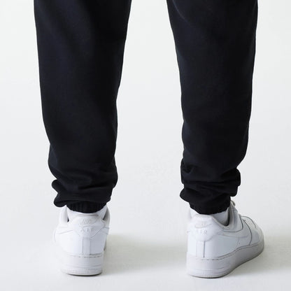 The model is wearing this New Era Cargo Joggers in black. 6