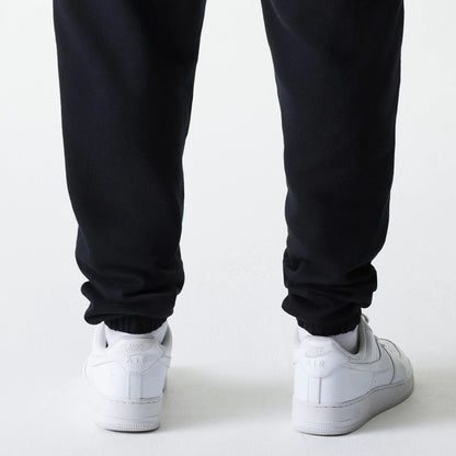 The model is wearing this New Era Cargo Joggers in black. 6