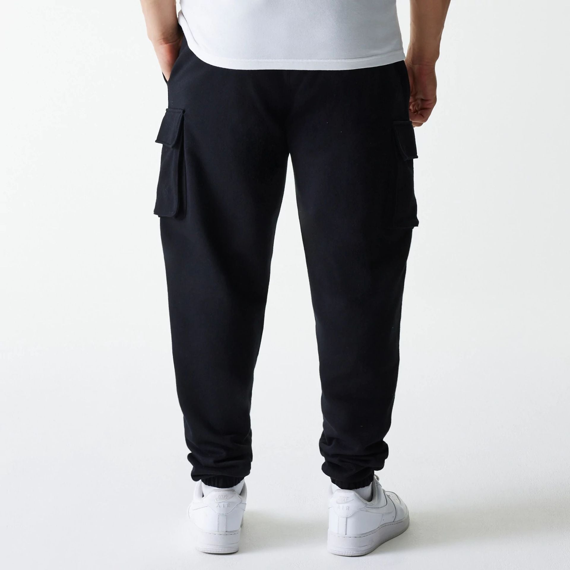 The model is wearing this New Era Cargo Joggers in black. 2
