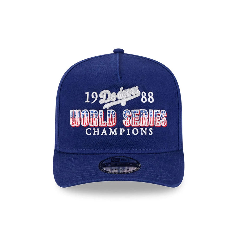 LA Dodgers MLB Historic Navy New Era 9FIFTY A-Frame Snapback Adjustable Cap, front view showing white and red embroidered 1988 Dodgers World Series Champions text on the structured navy crown, with a 9FIFTY size sticker on the visor.