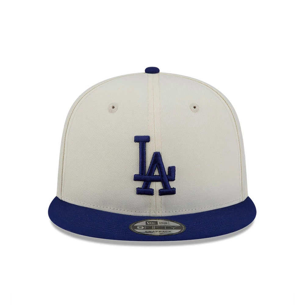 LA Dodgers MLB Localized White New Era 9FIFTY Snapback Adjustable Cap, front view showing the blue embroidered LA logo on the white front panel, with a blue flat visor and 9FIFTY size sticker.