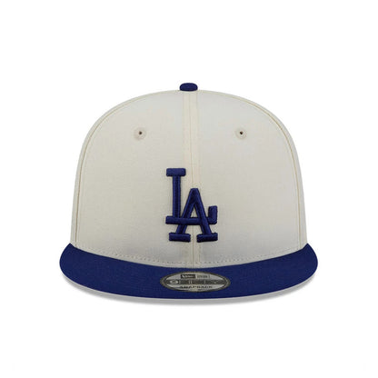 LA Dodgers MLB Localized White New Era 9FIFTY Snapback Adjustable Cap, front view showing the blue embroidered LA logo on the white front panel, with a blue flat visor and 9FIFTY size sticker.