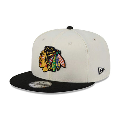 Pictured is this NHL Localized Chicago Blackhawks 9FIFTY Snapback cap in white. 4