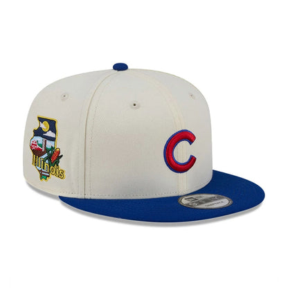 Pictured is this MLB Localized Chicago Cubs 9FIFTY Snapback cap in white. 1
