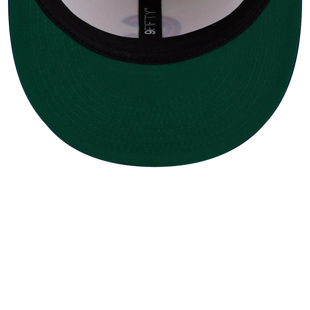Chicago Cubs MLB Localized White New Era 9FIFTY Snapback Adjustable Cap, inside view showing a dark green undervisor, black sweatband, and black taping with 9FIFTY lettering, against a white interior crown.