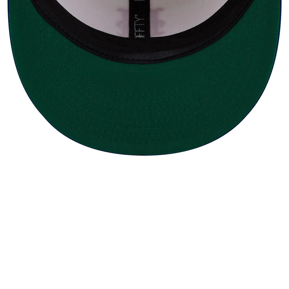 New York Mets MLB Localized White New Era 9FIFTY Snapback Adjustable Cap, inside view showing the green undervisor and black sweatband, with the New Era logo printed on the white interior taping.