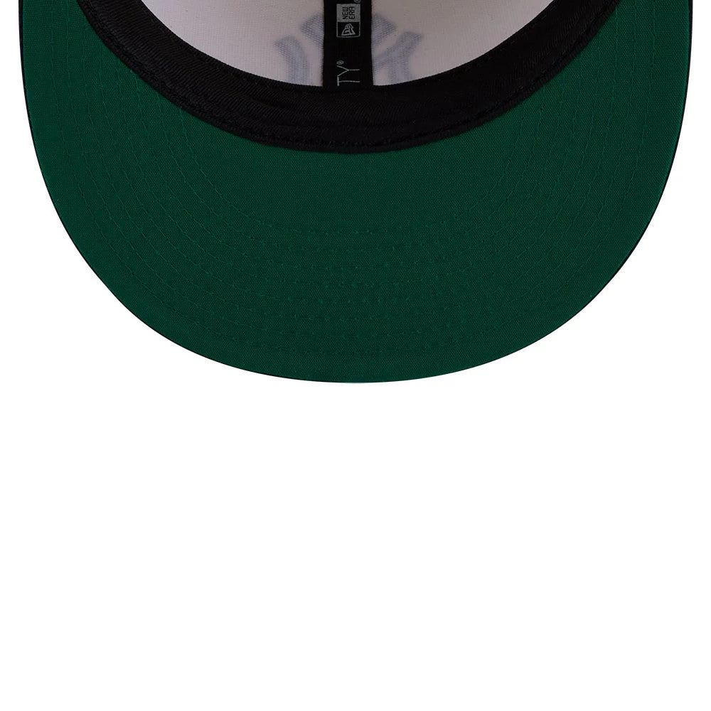 New York Yankees MLB Localized White New Era 9FIFTY Snapback Adjustable Cap, inside view showing the green undervisor, black sweatband, white interior panels with stitching, and inner tag detailing.