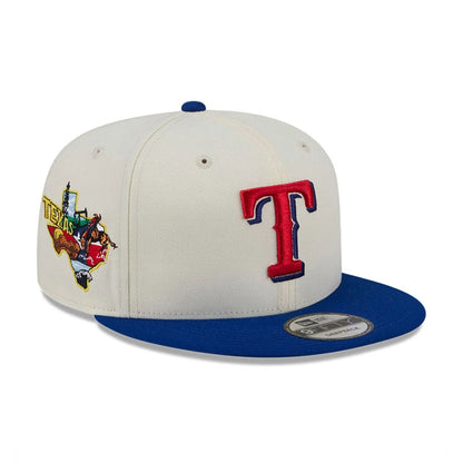 Pictured is this MLB Localized Texas Rangers 9FIFTY Snapback cap in white. 1