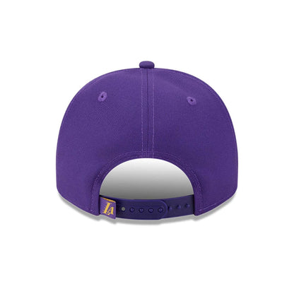 Pictured is this NBA Cartoon LA Lakers 9FIFTY A-Frame Snapback cap in purple. 5