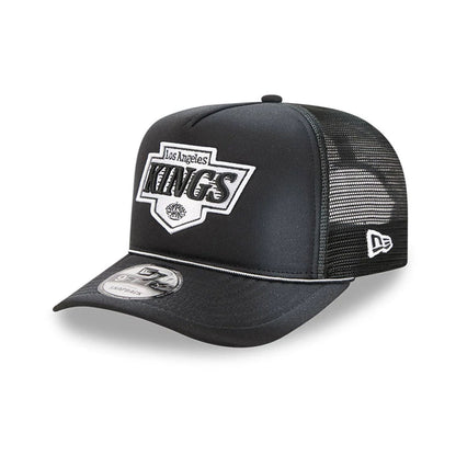Pictured is this NHL Washed LA Kings 9FIFTY A-Frame Trucker cap in black. 1