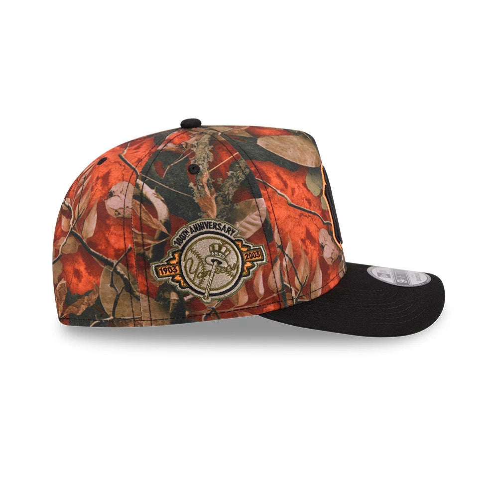 Pictured is this MLB Leaves New York Yankees 9FIFTY A-Frame Snapback cap in bright orange. 9