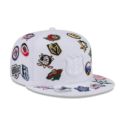 Pictured is this NHL All Over 59FIFTY Fitted cap in white. 4