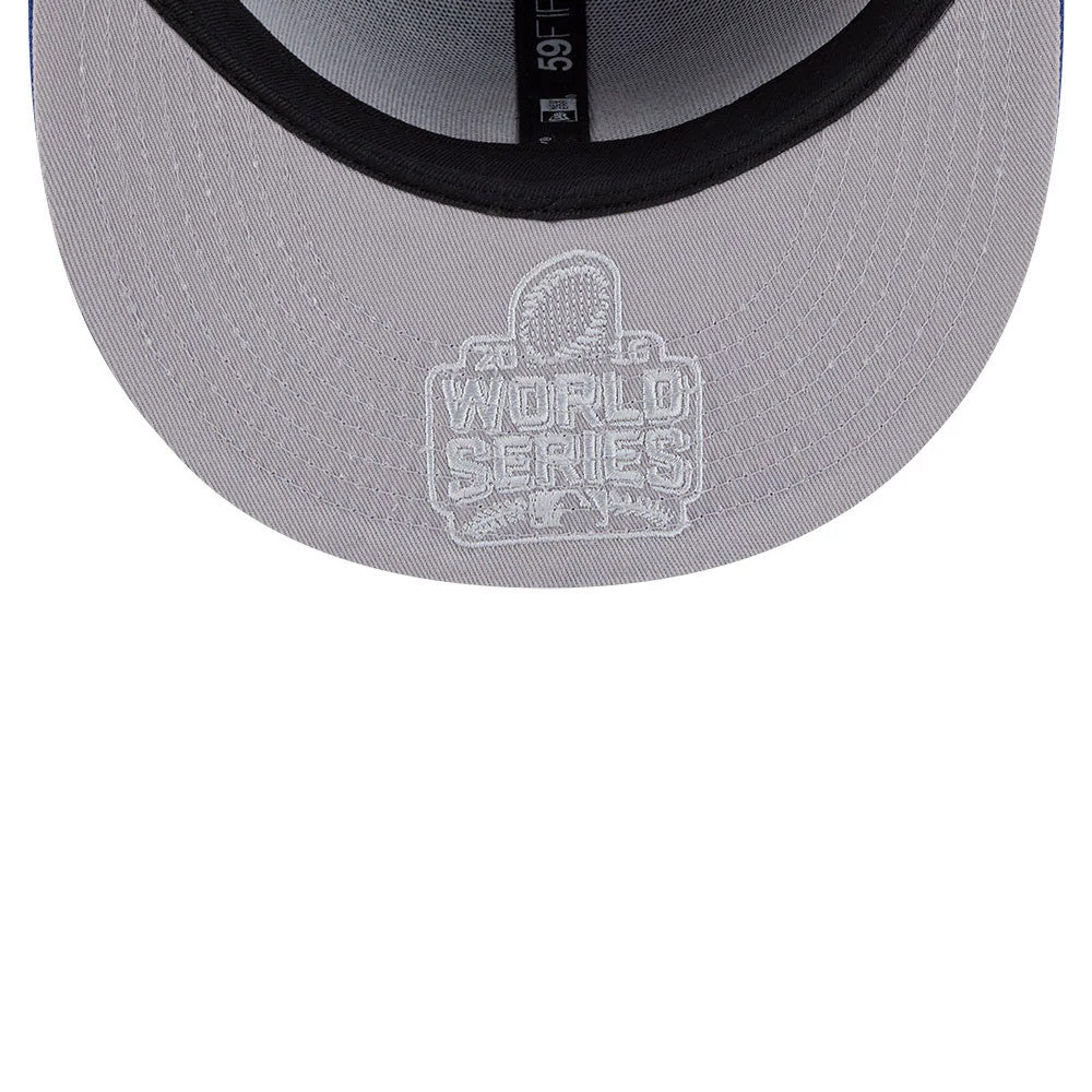 Chicago Cubs MLB Hidden Hit Blue New Era 59FIFTY Fitted Cap, inside view showing a grey undervisor with a white 2016 World Series Champions embroidery and a black sweatband with 59FIFTY branding.