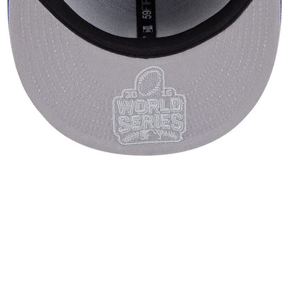 Chicago Cubs MLB Hidden Hit Blue New Era 59FIFTY Fitted Cap, inside view showing a grey undervisor with a white 2016 World Series Champions embroidery and a black sweatband with 59FIFTY branding.