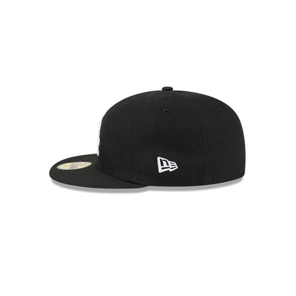 Chicago White Sox MLB Hidden Hit Black New Era 59FIFTY Fitted Cap, side view showing the white embroidered New Era flag logo on the left side of the structured black crown and a gold 59FIFTY size sticker on the black visor.