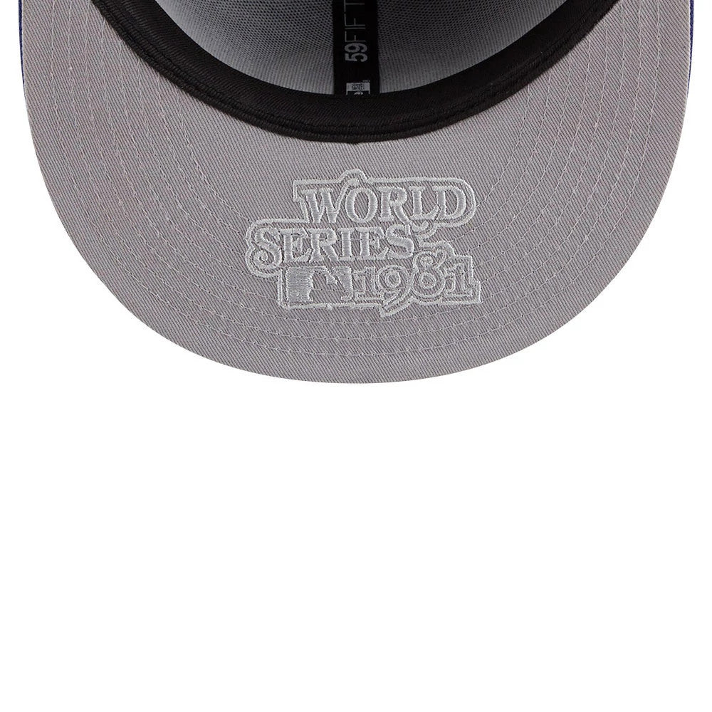 LA Dodgers MLB Cooperstown Hidden Hit Dark Blue New Era 59FIFTY Fitted Cap, inside view showing a grey undervisor with white embroidered World Series 1981 logo, black sweatband, and 59FIFTY taping along the inner crown.