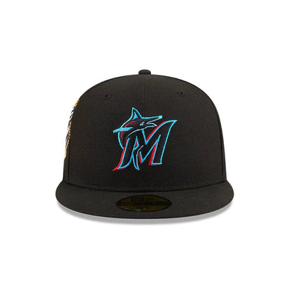 Pictured is this MLB Hidden Hit Miami Marlins 59FIFTY Fitted cap in black. 3