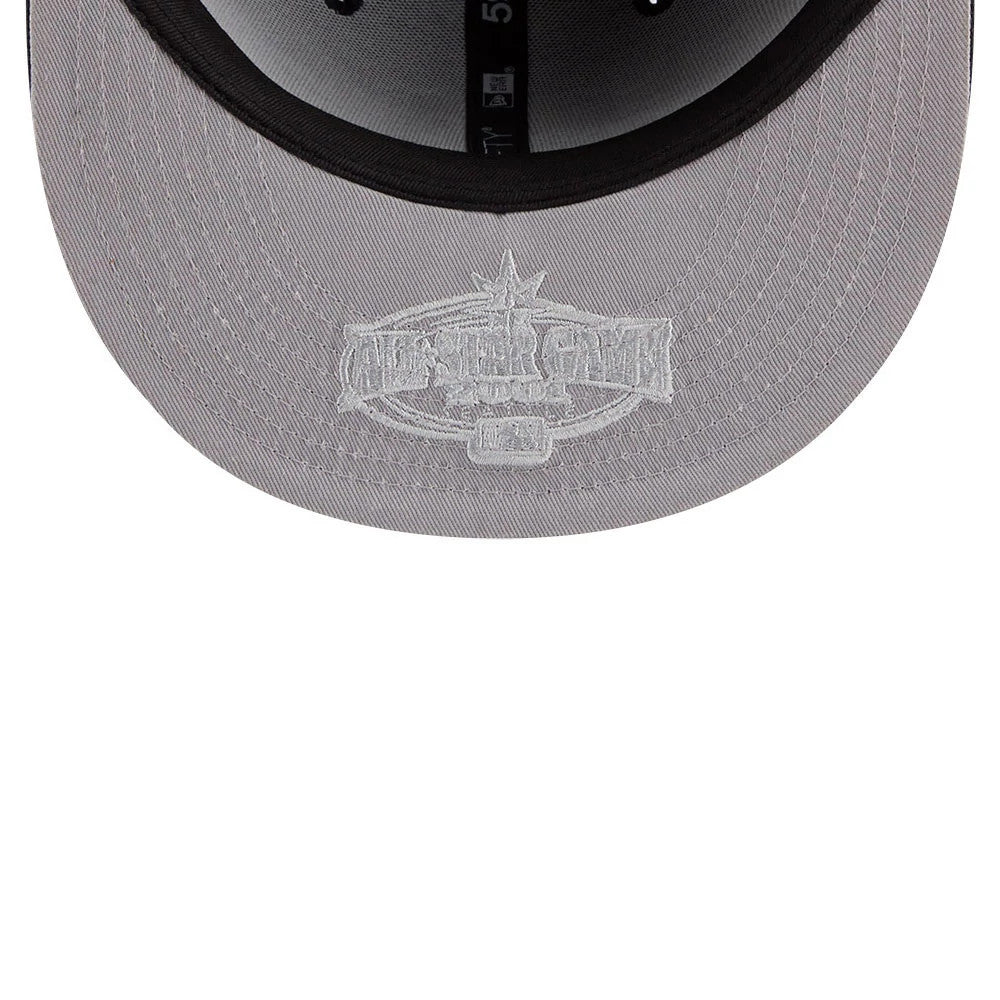 Seattle Mariners MLB Hidden Hit Navy New Era 59FIFTY Fitted Cap, inside view showing grey undervisor with a detailed white embroidered graphic, black sweatband with size label, and branded taping running across the inner panels.