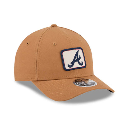 Pictured is this MLB Team Choice Atlanta Braves 9FORTY M-Crown cap in beige. 5