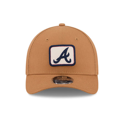 Pictured is this MLB Team Choice Atlanta Braves 9FORTY M-Crown cap in beige. 9