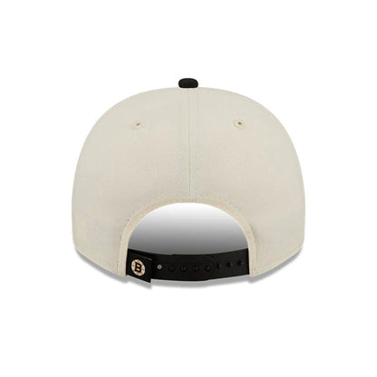 Pictured is this NHL Classic Boston Bruins 9FIFTY A-Frame Snapback cap in White. 7