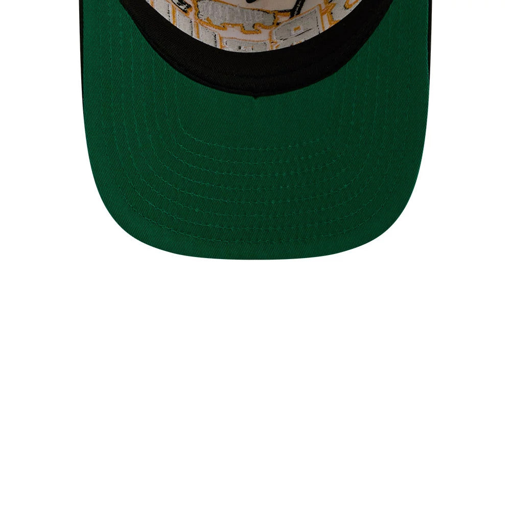 Boston Bruins NHL Classic White New Era 9FIFTY A-Frame Snapback Adjustable Cap, inside view showing the green undervisor and black sweatband with a gold patterned lining beneath the structured crown.