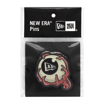 This is a  New Era Eye Ball Glow In The Dark Silver Pin Badge 2