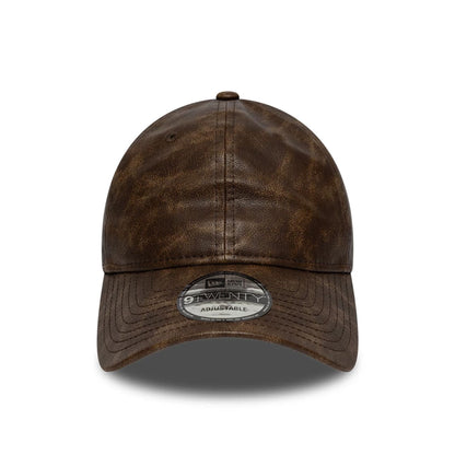This is a  New Era Worn PU Dark Brown 9TWENTY Adjustable Cap 3