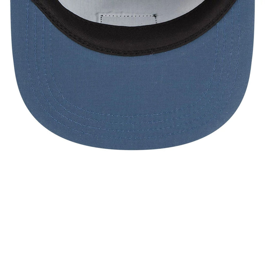 This is a The Goonies Astoria Warner Brothers Open Blue Camper Cap 7