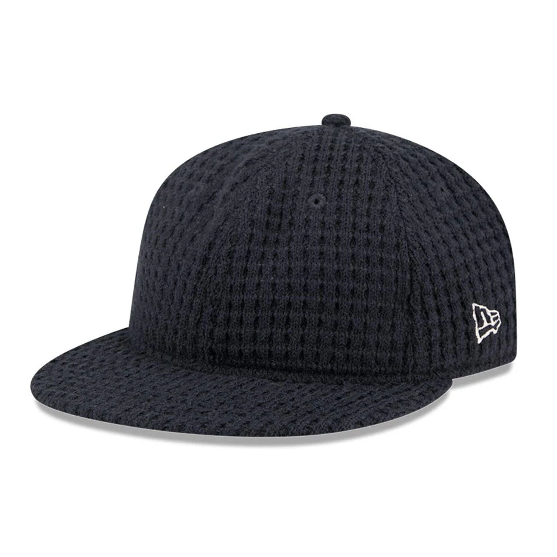 This is a  New Era Waffle Knit Navy Retro Crown 9FIFTY Adjustable Cap 1