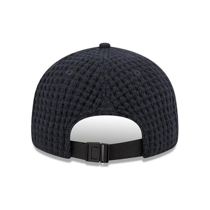 This is a  New Era Waffle Knit Navy Retro Crown 9FIFTY Adjustable Cap 5