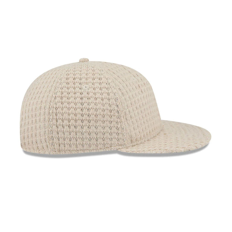 This is a  New Era Waffle Knit Light Beige Retro Crown 9FIFTY Adjustable Cap 7