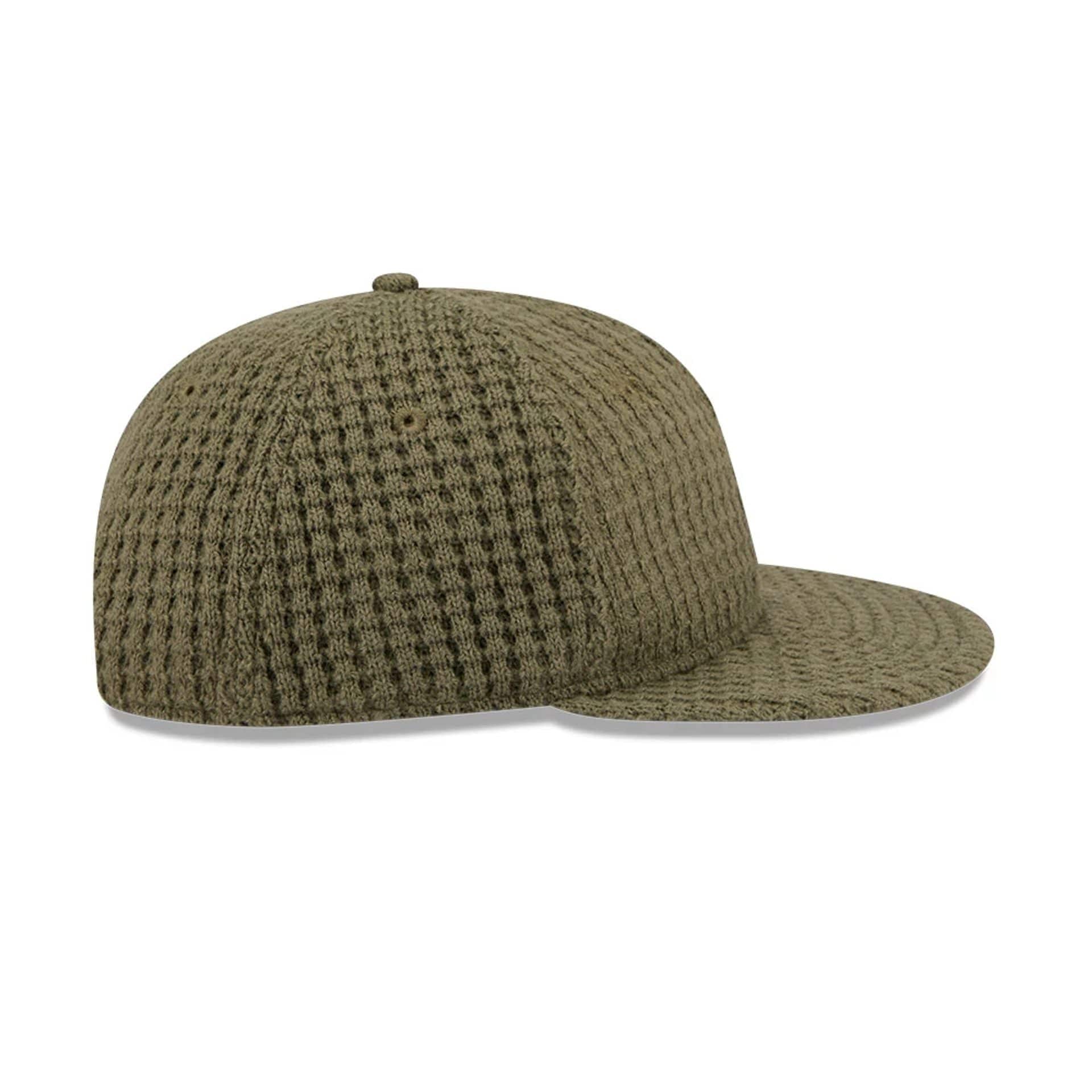 This is a  New Era Waffle Knit Green Retro Crown 9FIFTY Adjustable Cap 7