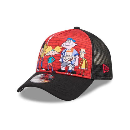 Hey Arnold Graphic Black New Era 9FORTY A-Frame Trucker Adjustable Cap, three-quarter view showing a colourful cartoon graphic on the front panels with a red background, black visor with a 9FORTY size sticker.