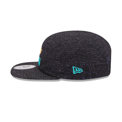 New Era Hey Arnold All Over Print Black Camper Cap, side view with teal embroidered New Era flag logo on the left side and intricate white script text covering the entire structured black crown and flat visor, with a 9FORTY size sticker.