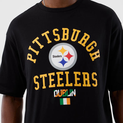 The Male model is wearing Pittsburgh Steelers NFL International Series Games Black Oversized T-Shirt  3