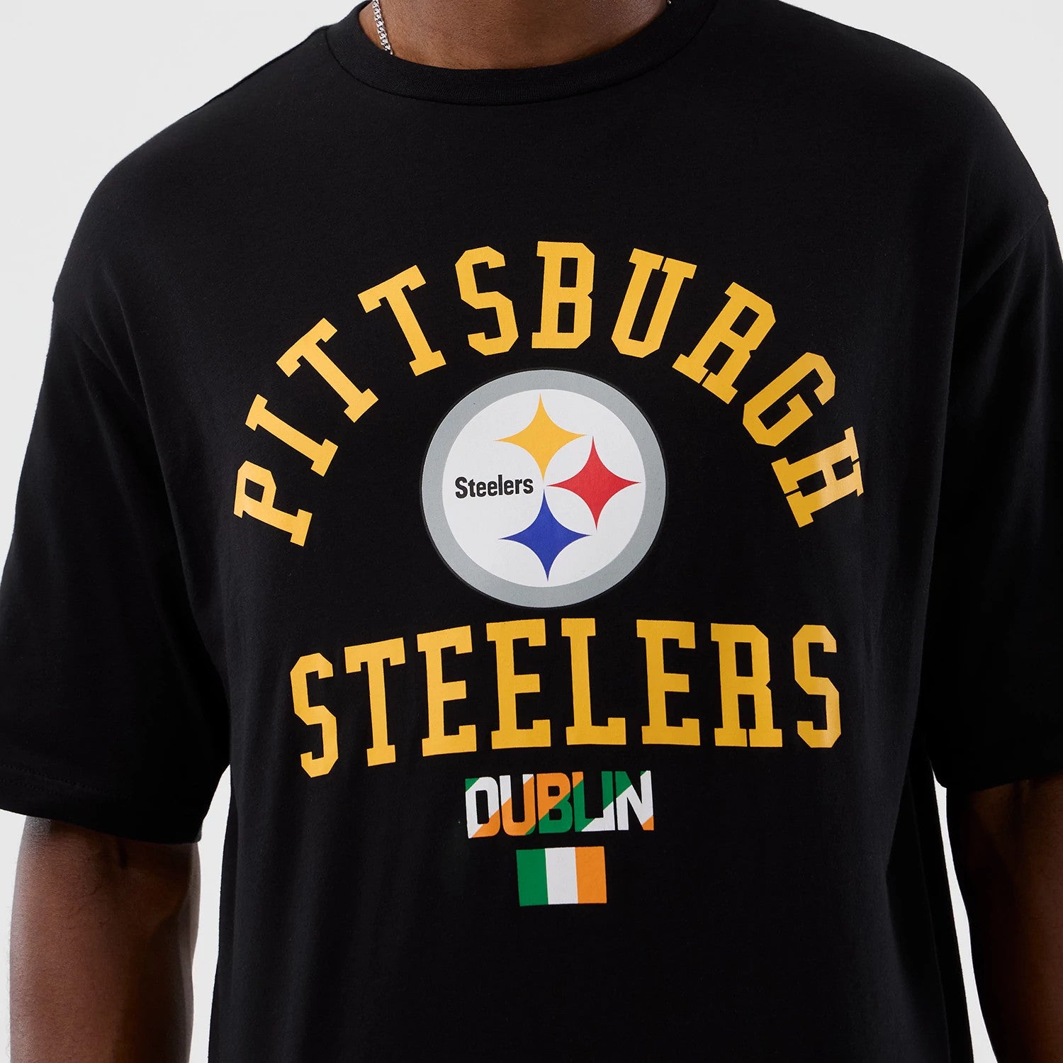 The Male model is wearing Pittsburgh Steelers NFL International Series Games Black Oversized T-Shirt 3