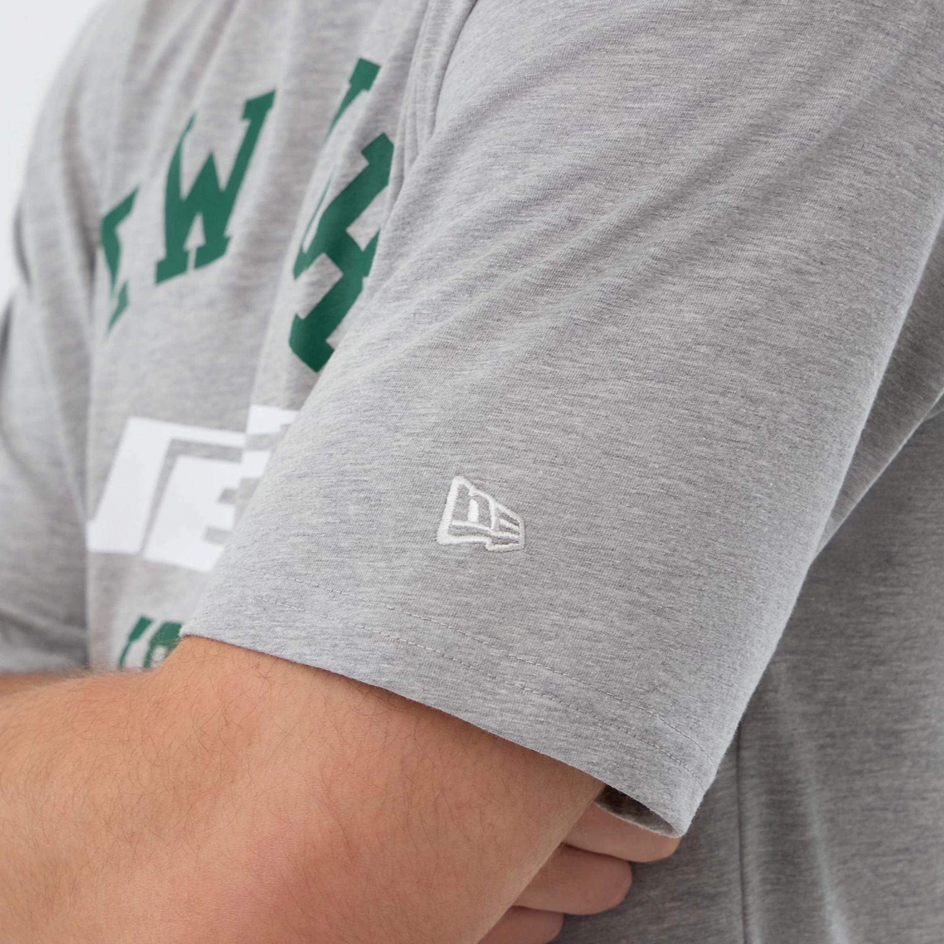 The Male model is wearing New York Jets NFL International Series Games Grey Oversized T-Shirt  5