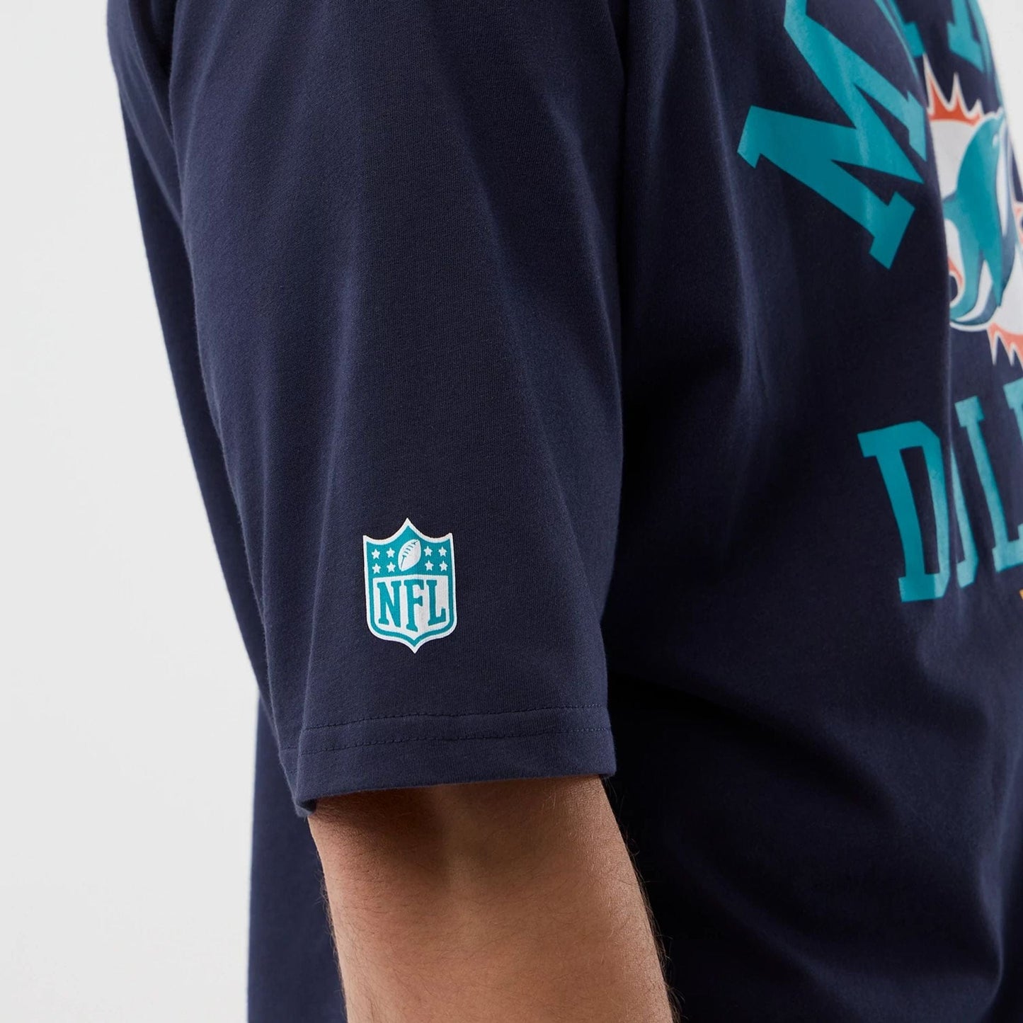 The Male model is wearing Miami Dolphins NFL International Series Games Navy Oversized T-Shirt  5