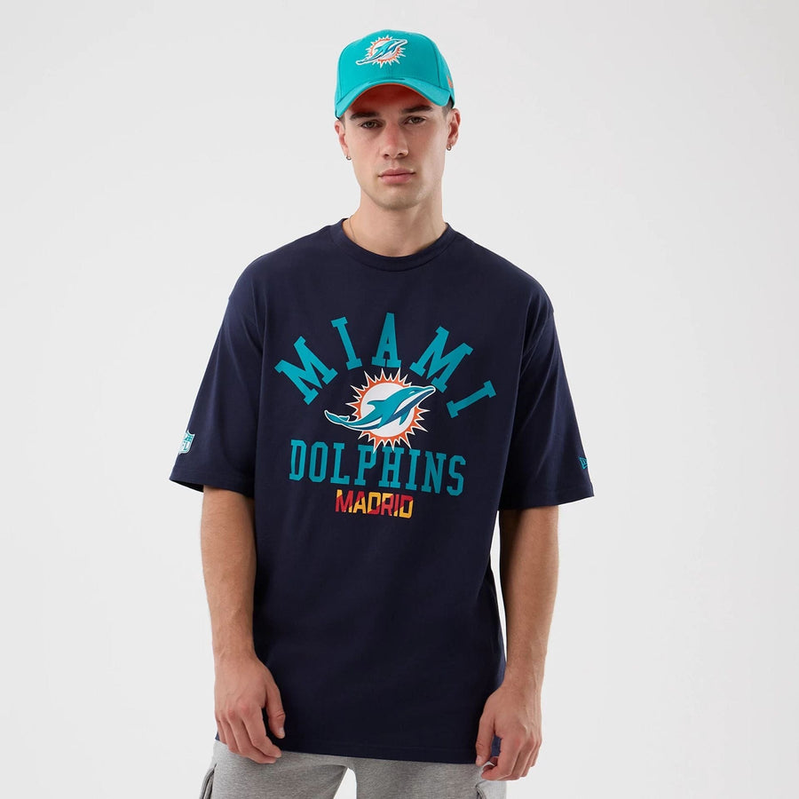 The Male model is wearing Miami Dolphins NFL International Series Games Navy Oversized T-Shirt  1