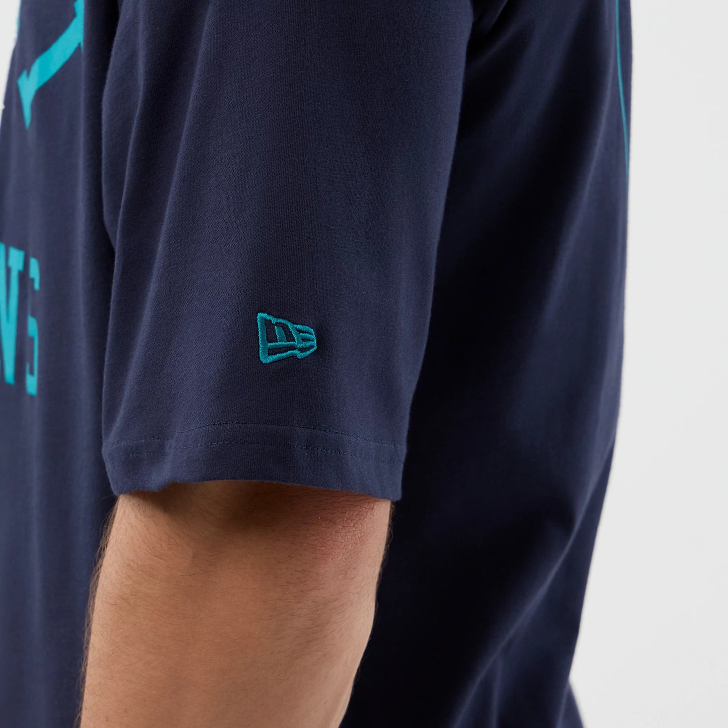 The Male model is wearing Miami Dolphins NFL International Series Games Navy Oversized T-Shirt 6