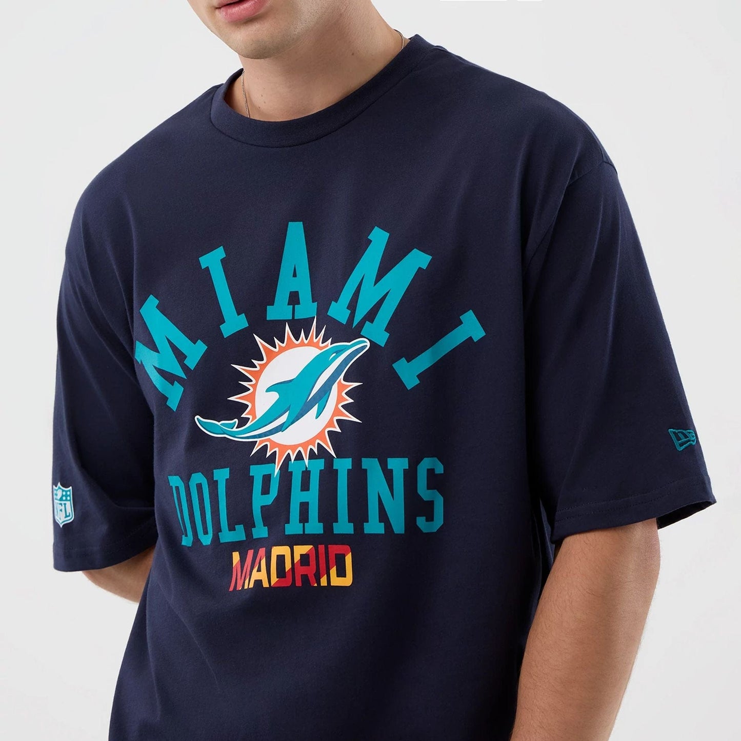 The Male model is wearing Miami Dolphins NFL International Series Games Navy Oversized T-Shirt  3