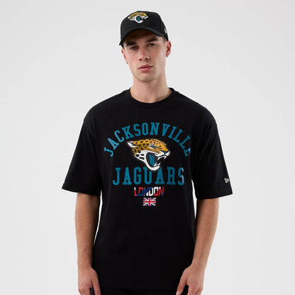 The Male model is wearing Jacksonville Jaguars NFL International Series Games Black Oversized T-Shirt  1