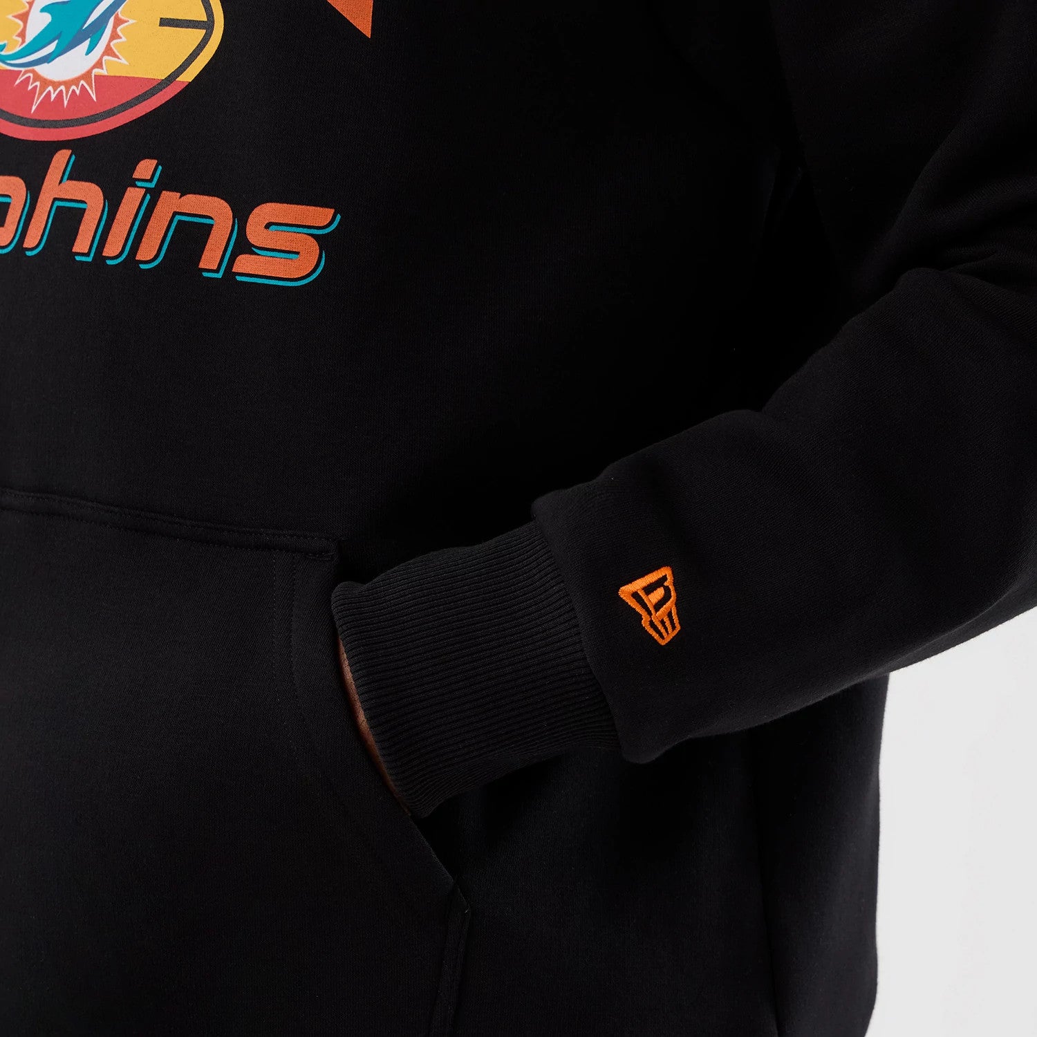 The Male model is wearing Miami Dolphins NFL International Series Games Patch Black Pullover Hoodie 5