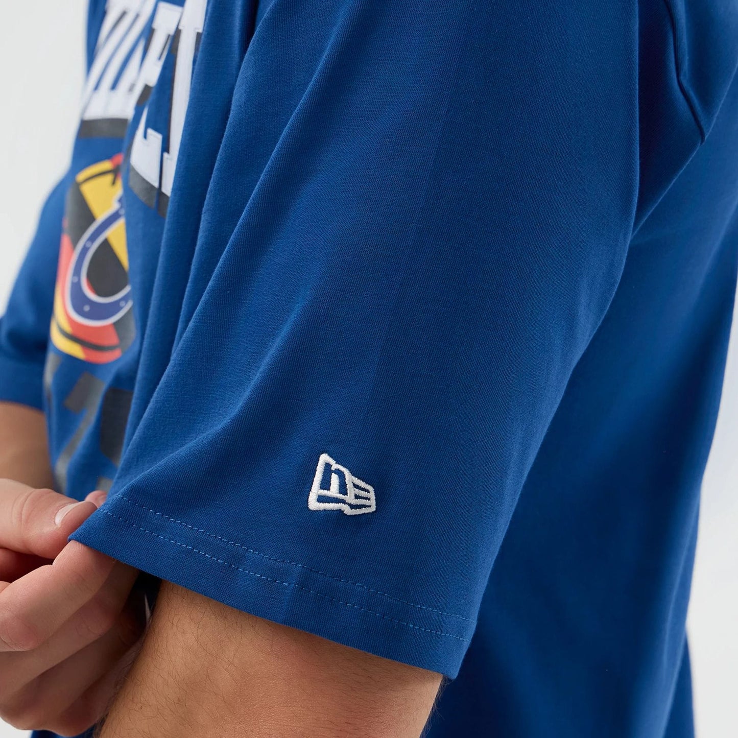 The Male model is wearing Indianapolis Colts NFL International Series Games Blue Oversized T-Shirt  4