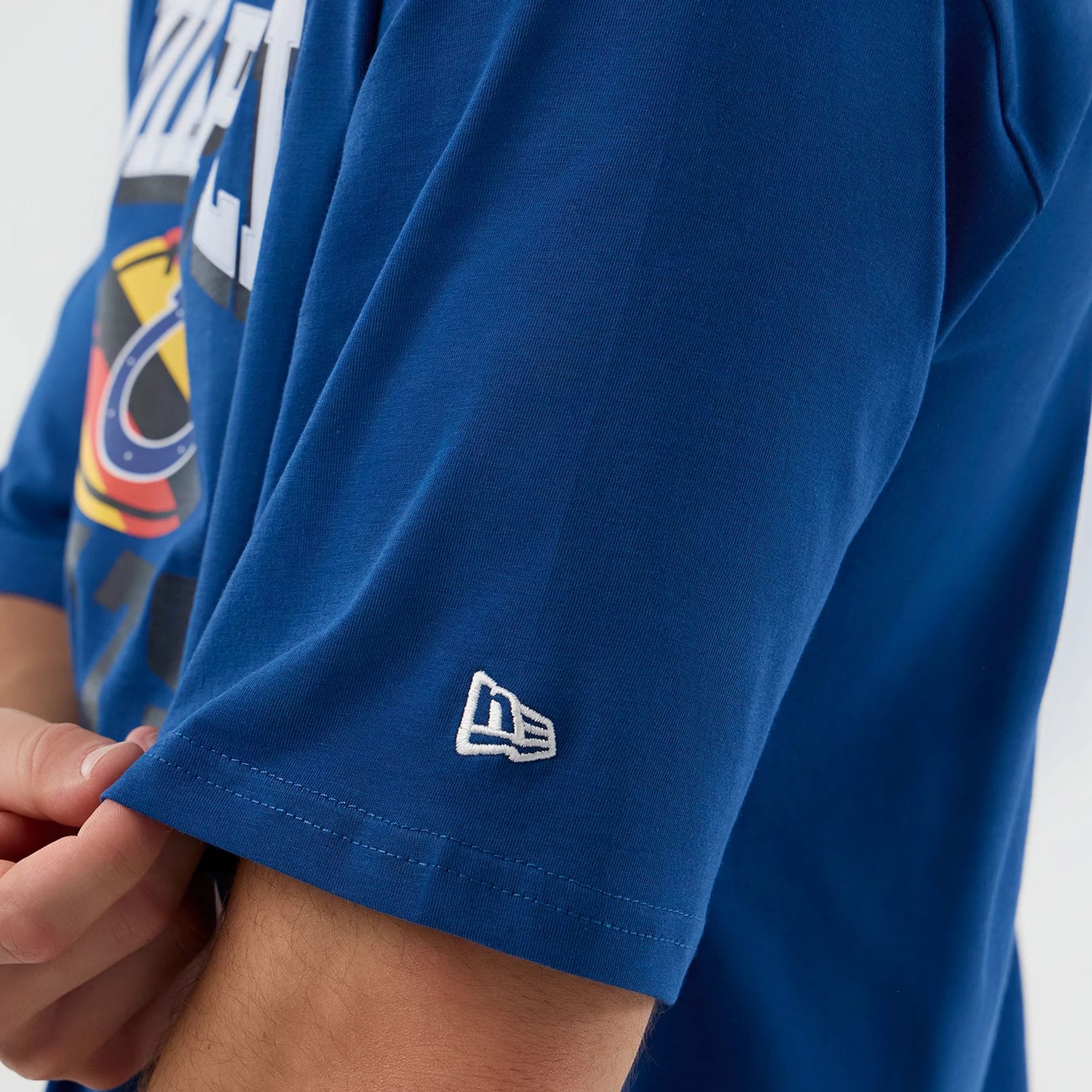 The Male model is wearing Indianapolis Colts NFL International Series Games Blue Oversized T-Shirt  4