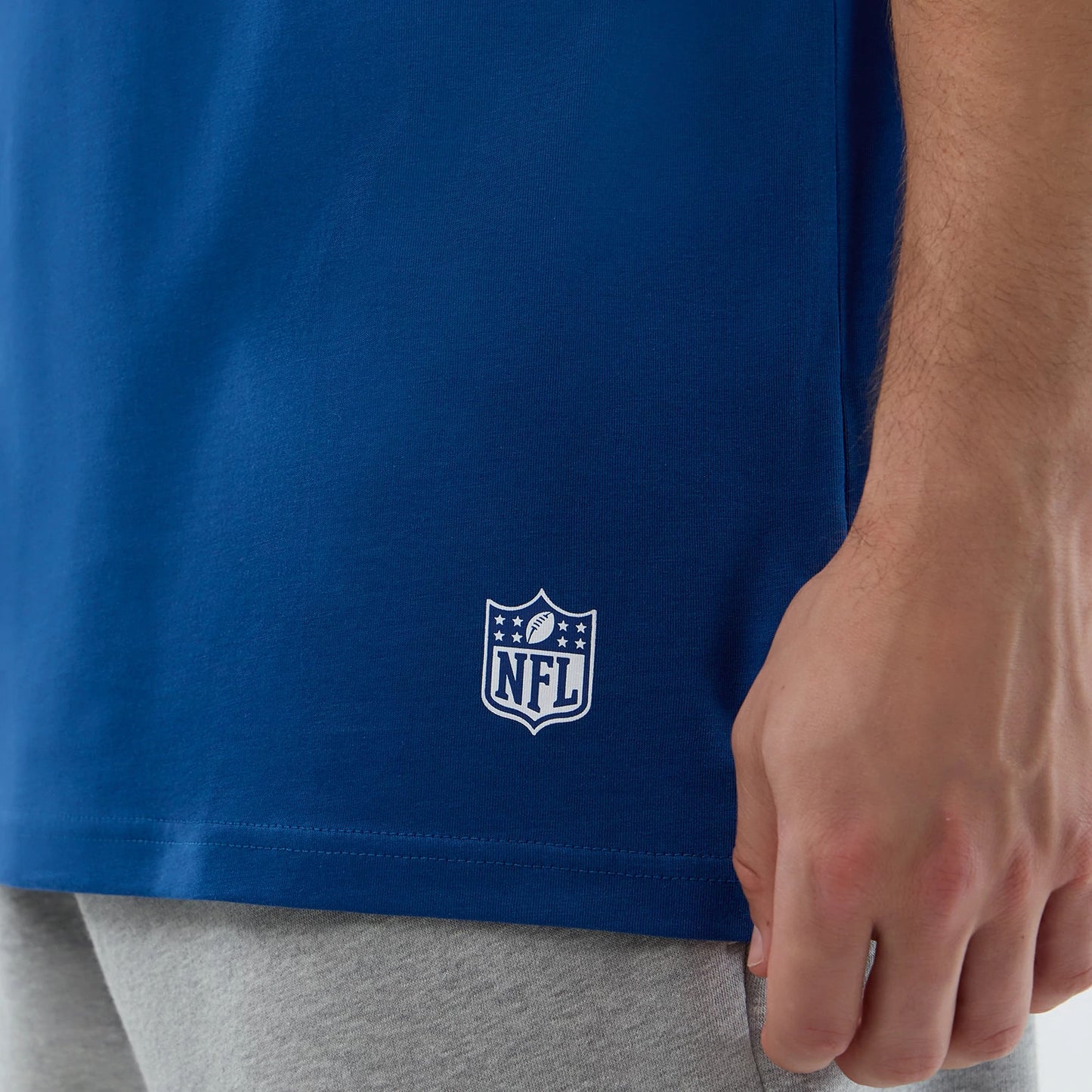 The Male model is wearing Indianapolis Colts NFL International Series Games Script Blue Oversized T-Shirt 5