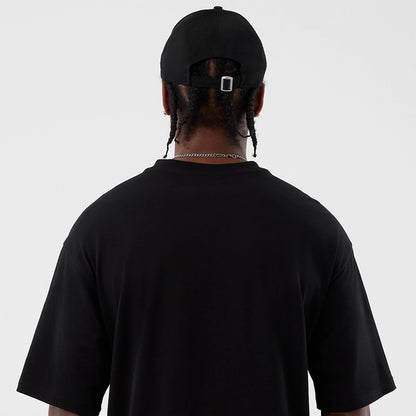 The Male model is wearing Berlin NFL International Series Games Black Oversized T-Shirt 7