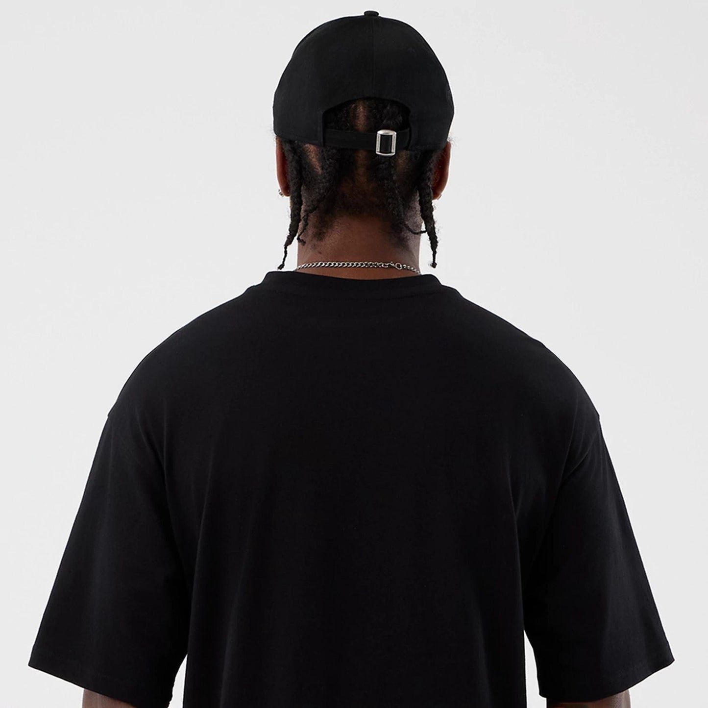 The Male model is wearing Berlin NFL International Series Games Black Oversized T-Shirt  7