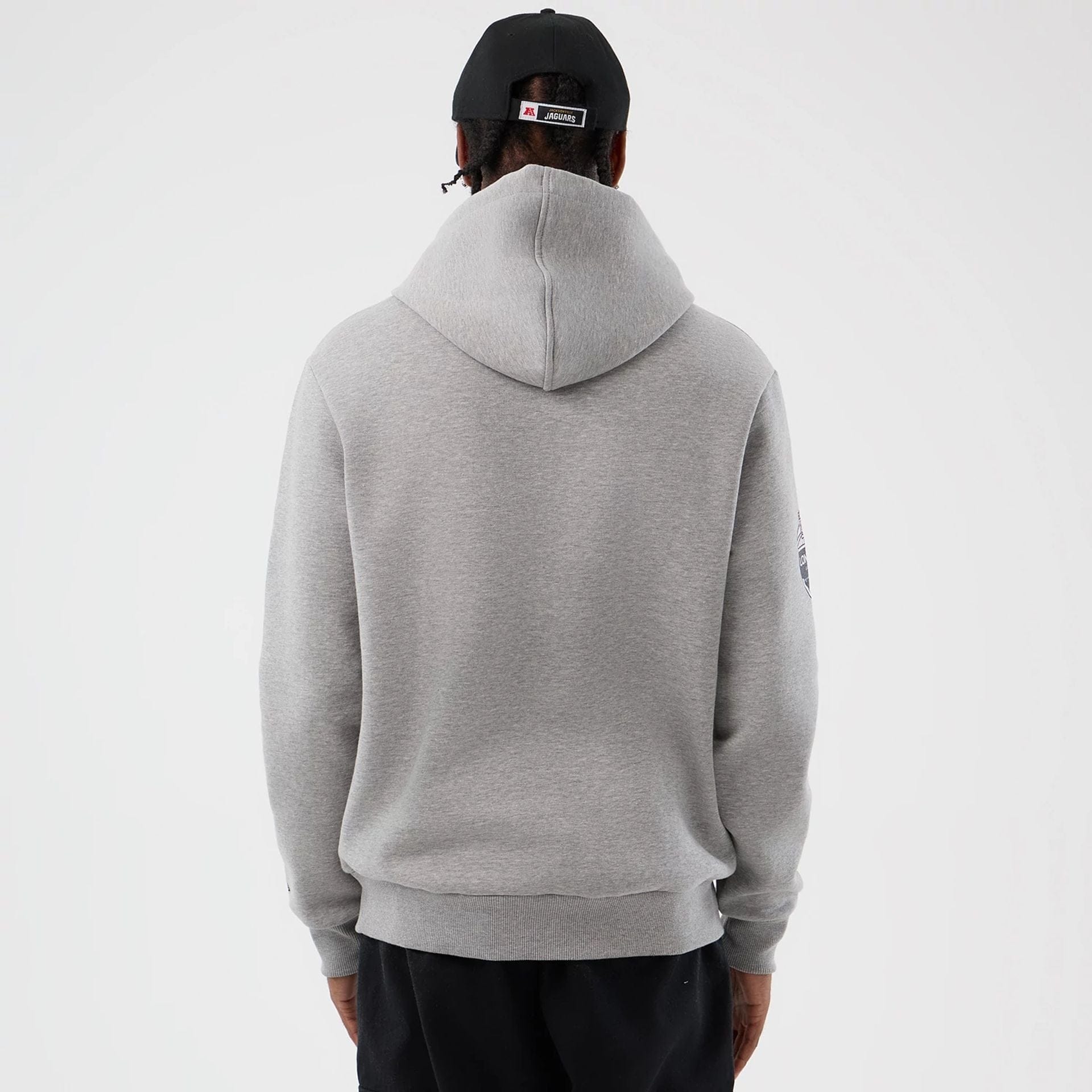 The Male model is wearing Jacksonville Jaguars NFL International Series Games Grey Pullover Hoodie  2